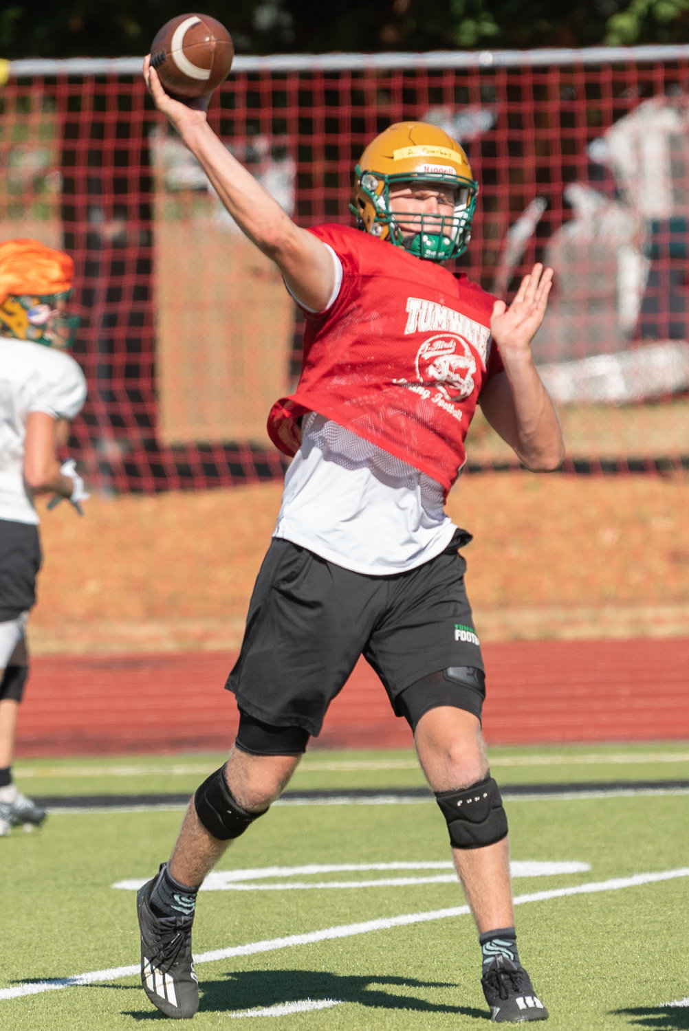 Tumwater's Alex Overbay throws a pass during the T-Birds' Aug. 22 practice.